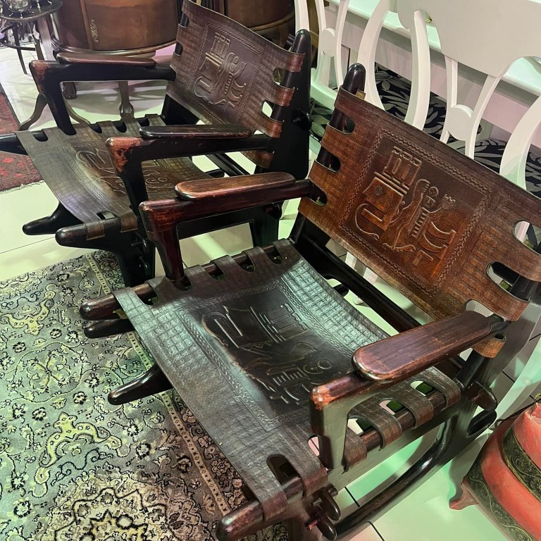 Pair of Angel Pazmino Teak wood and leather rocking armchairs, circa 1960d, Ecuador: R10,000 each