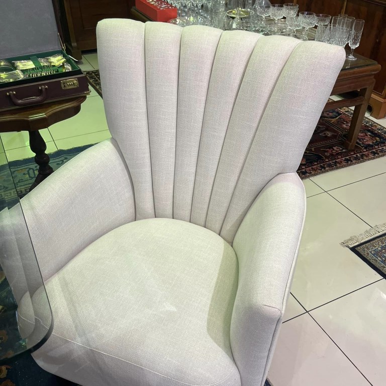 Pair of Art Deco style scalloped wingback chairs