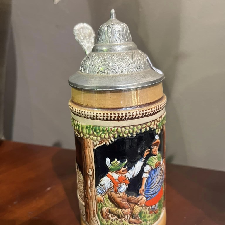 SOLD: “Ein Frohlisch Herz heilt allen Schmerz” - “A happy heart heals all pain” King beer stein, c1970s