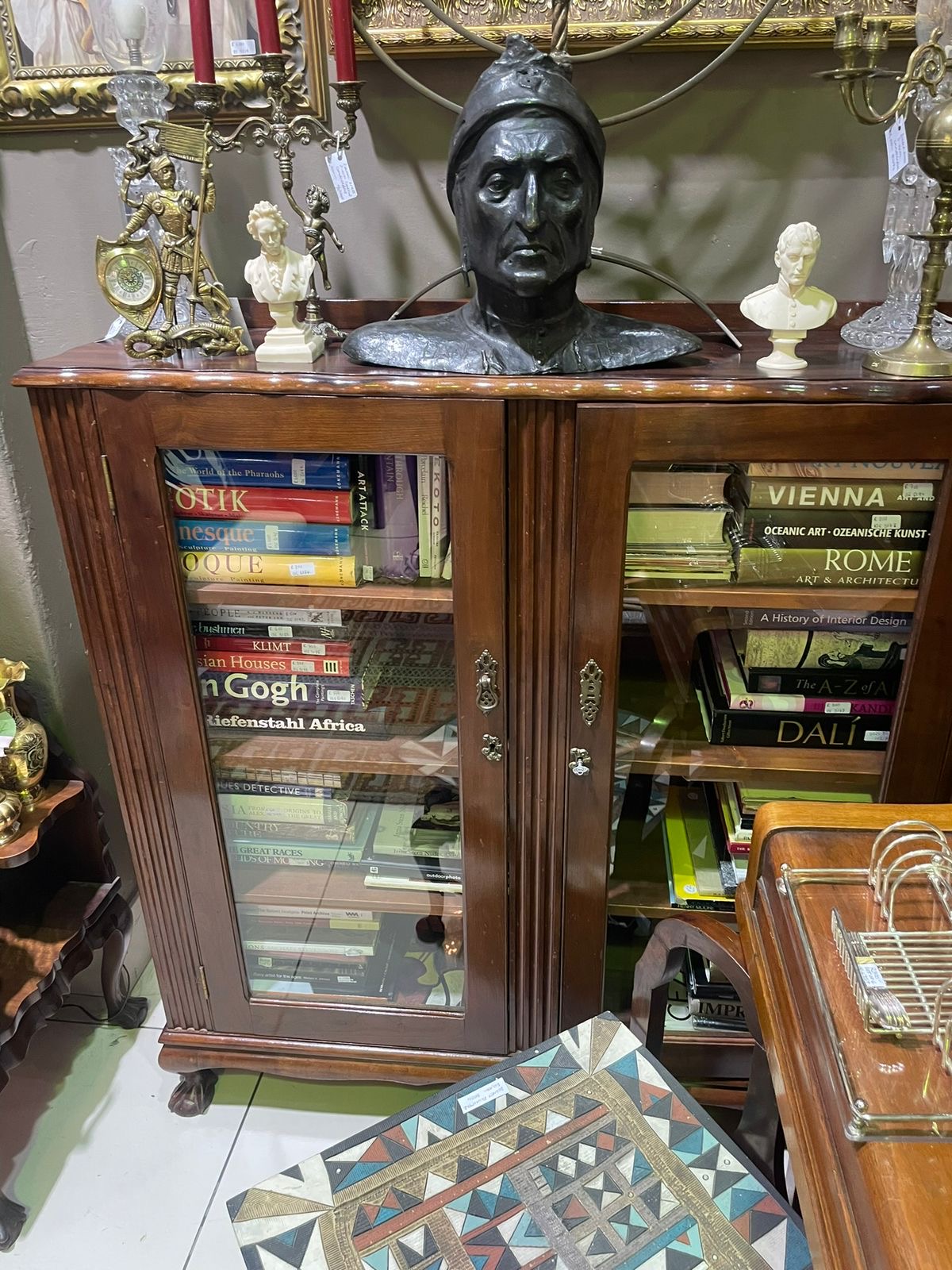 Stinkwood ball & claw display cabinet: R22,000