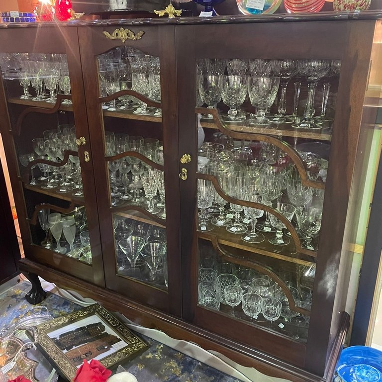 Stinkwood ball & claw display cabinet: R35,000
