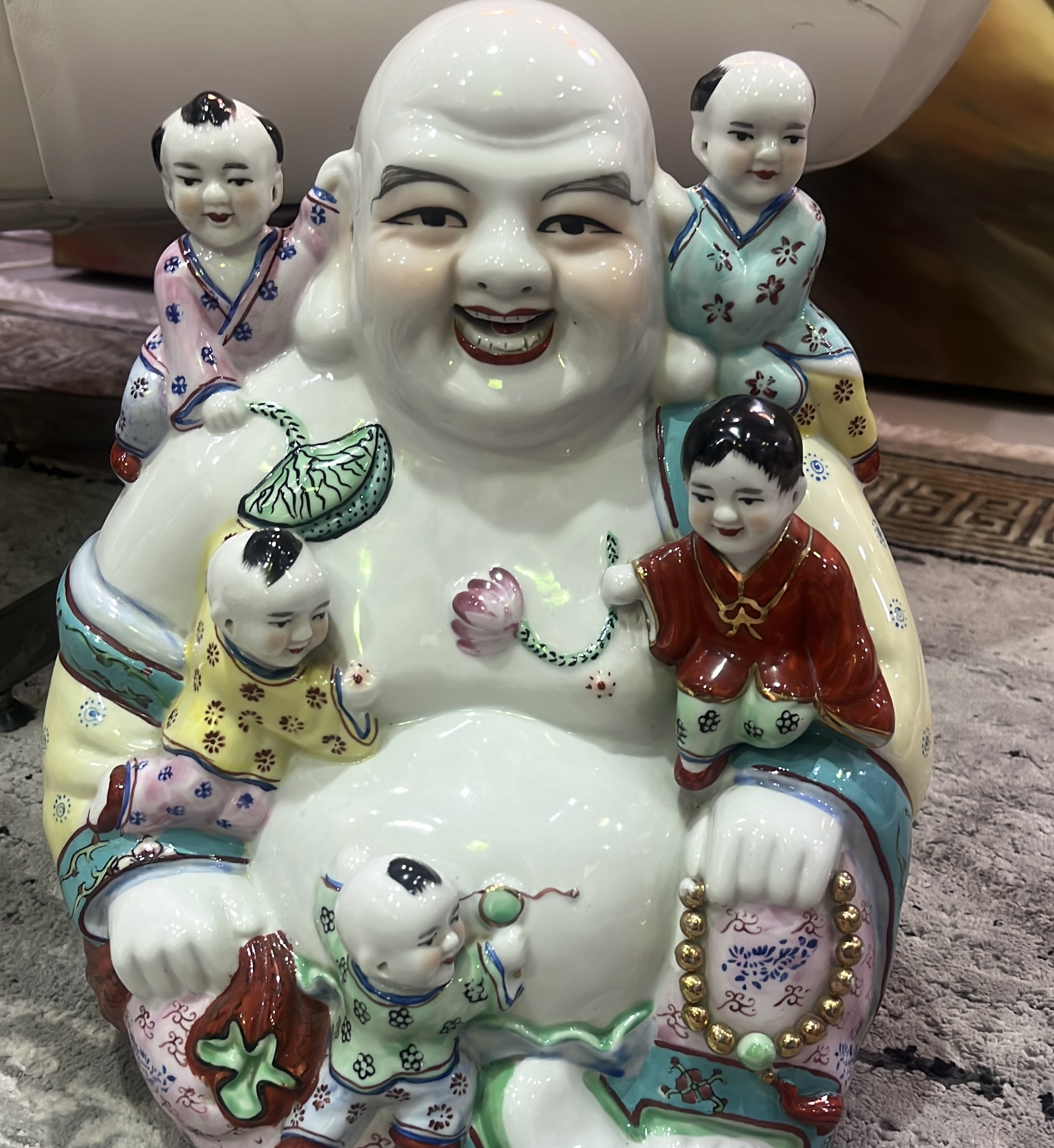 Porcelain laughing buddha