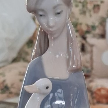 Nao by Lladro girl holding a duck or goose: R2,500