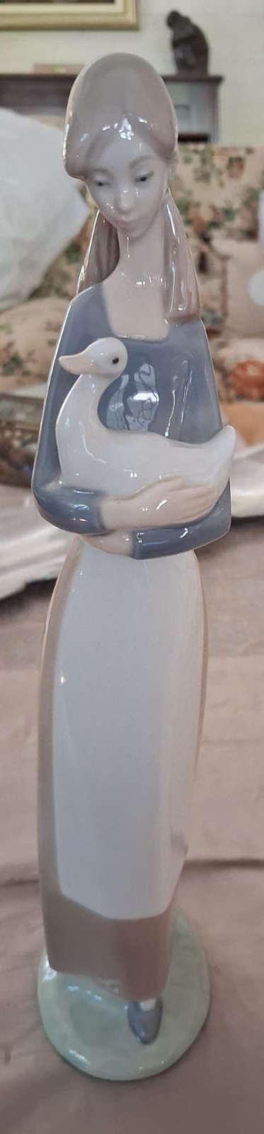 Nao by Lladro girl holding a duck or goose: R2,500