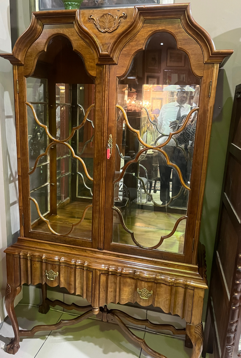 Stinkwood ball & claw display cabinet: R35,000
