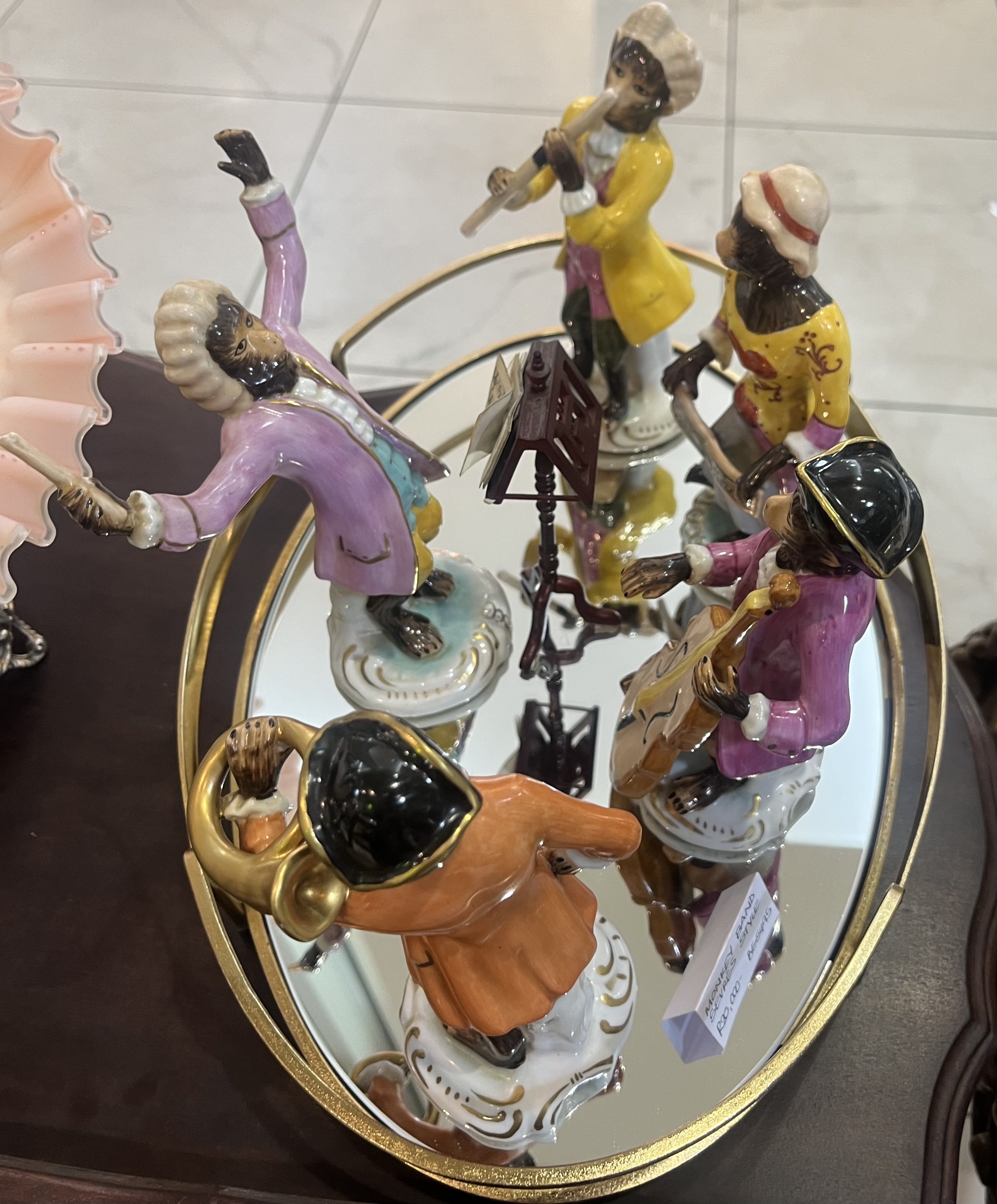 Five Sevres style porcelain "Monkey Band" figurines