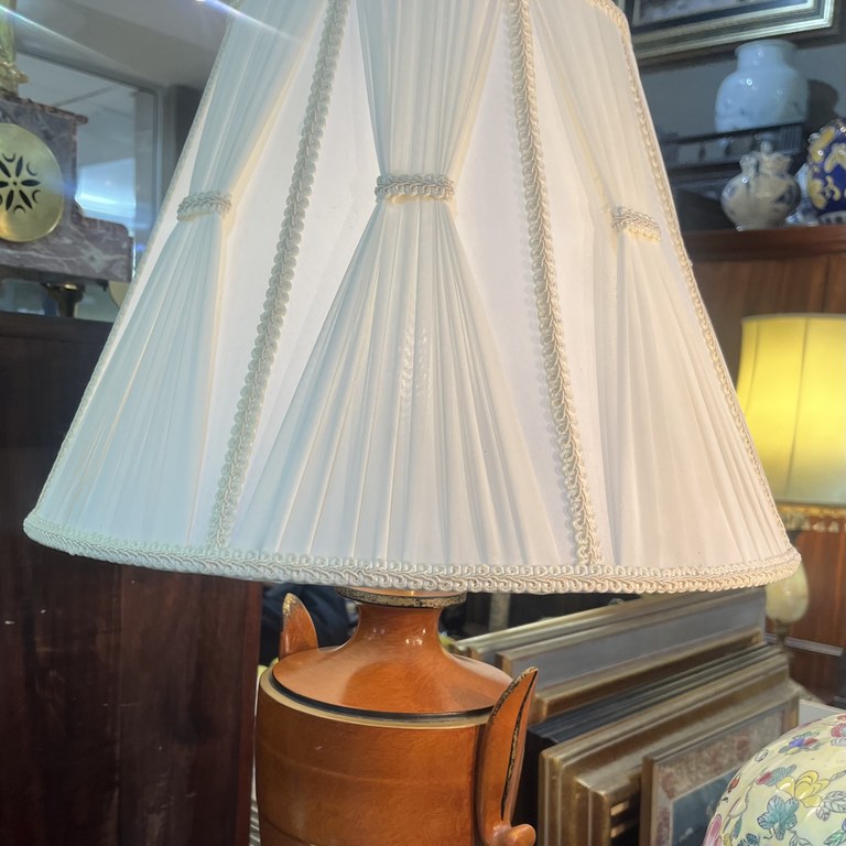 Pair of ceramic cold painted urn shaped table lamps with pleated cream shades