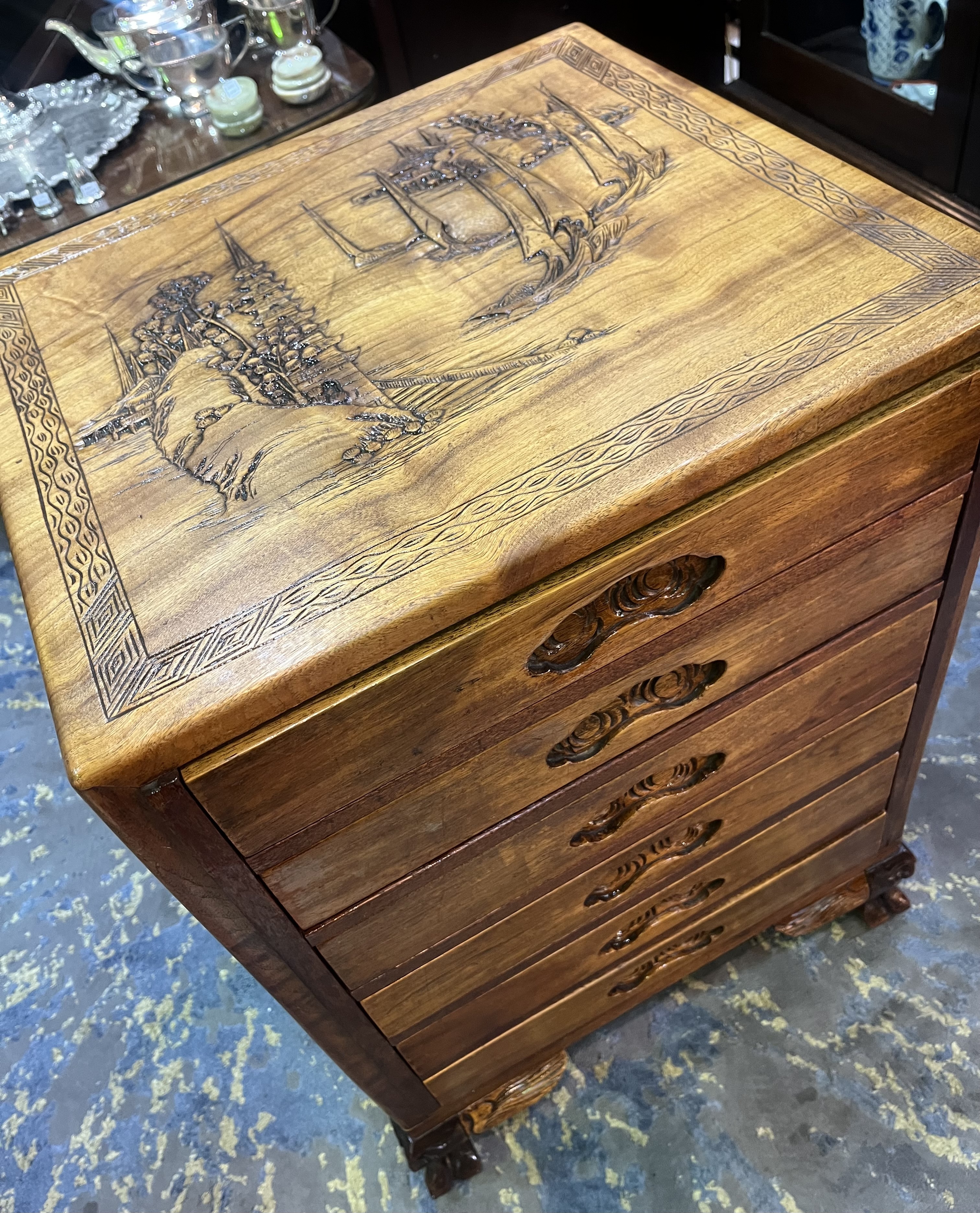 Chinese oak chest of drawers with carved scenes, early 1900s