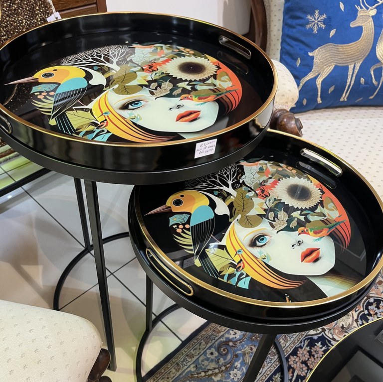 Pair of black ciruclar nesting tables