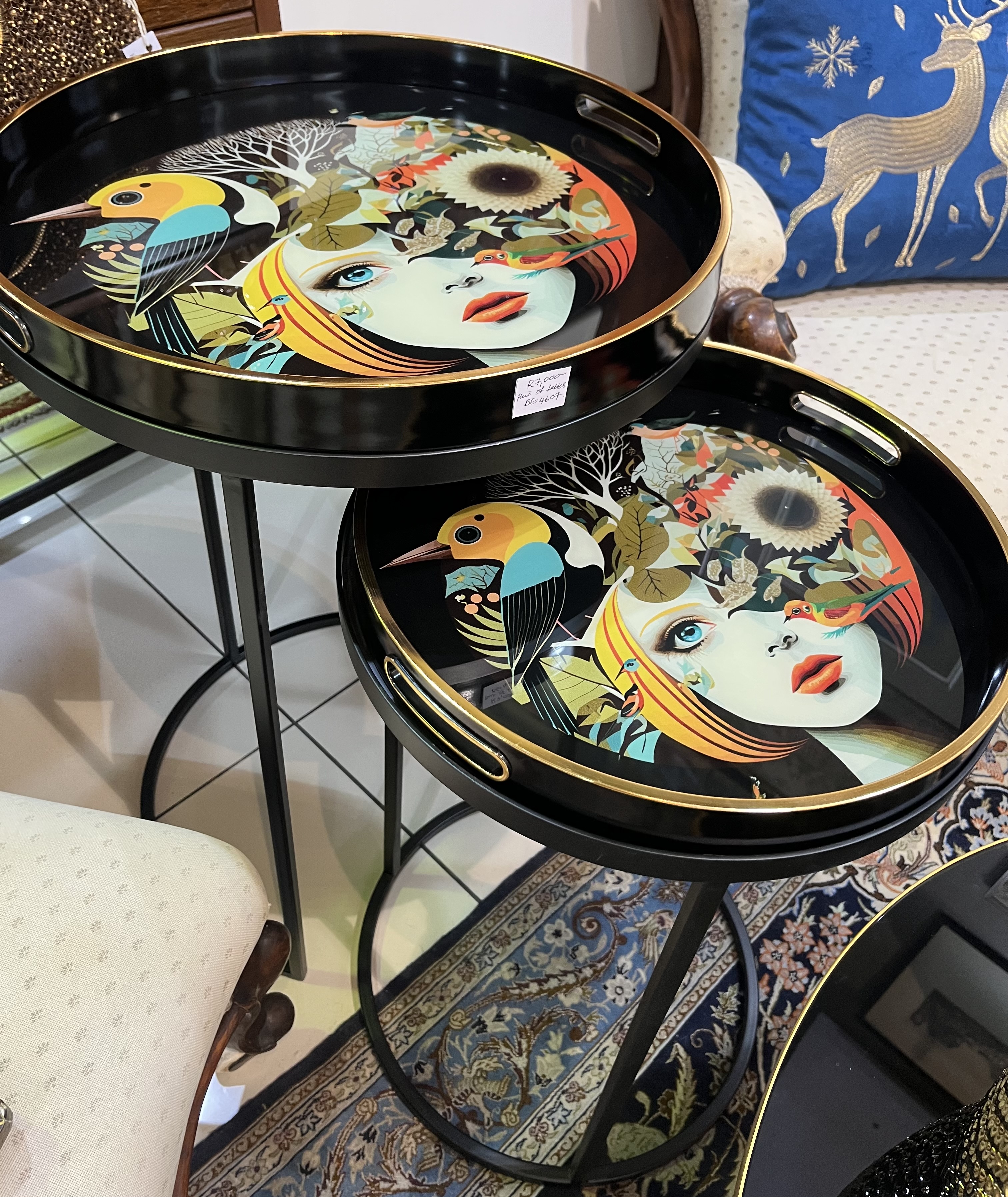 Pair of black ciruclar nesting tables