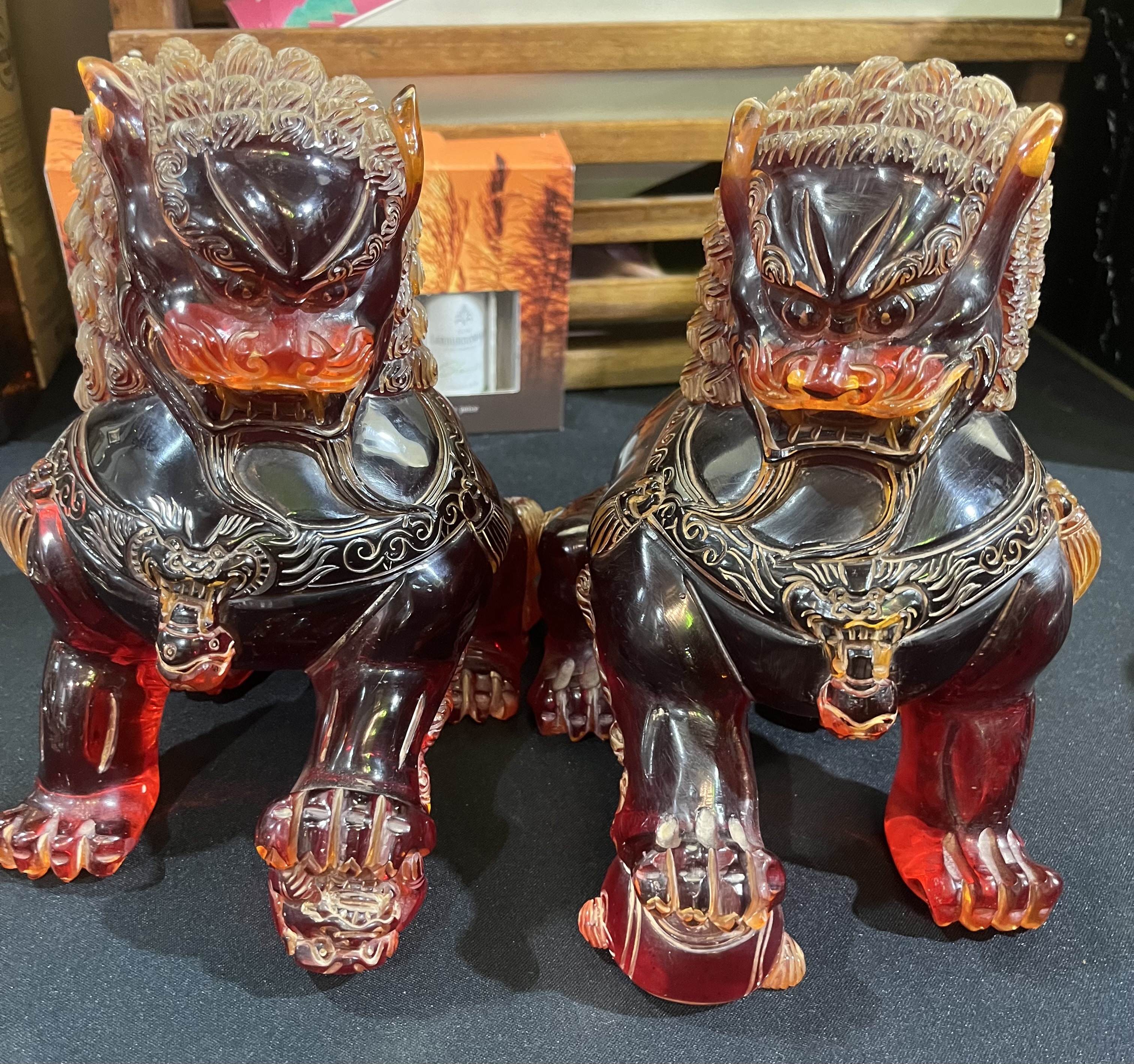 Vintage pair of Chinese amber foo dogs