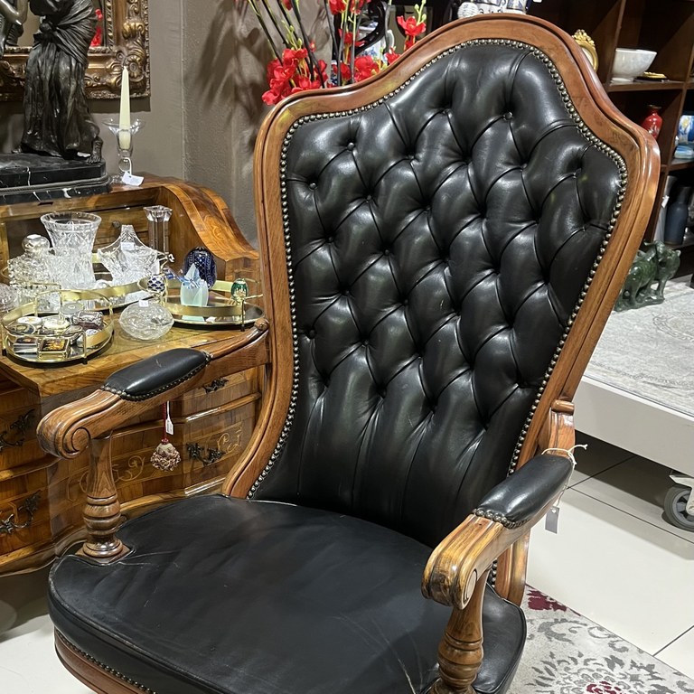 Oversized executive leather swivel armchair