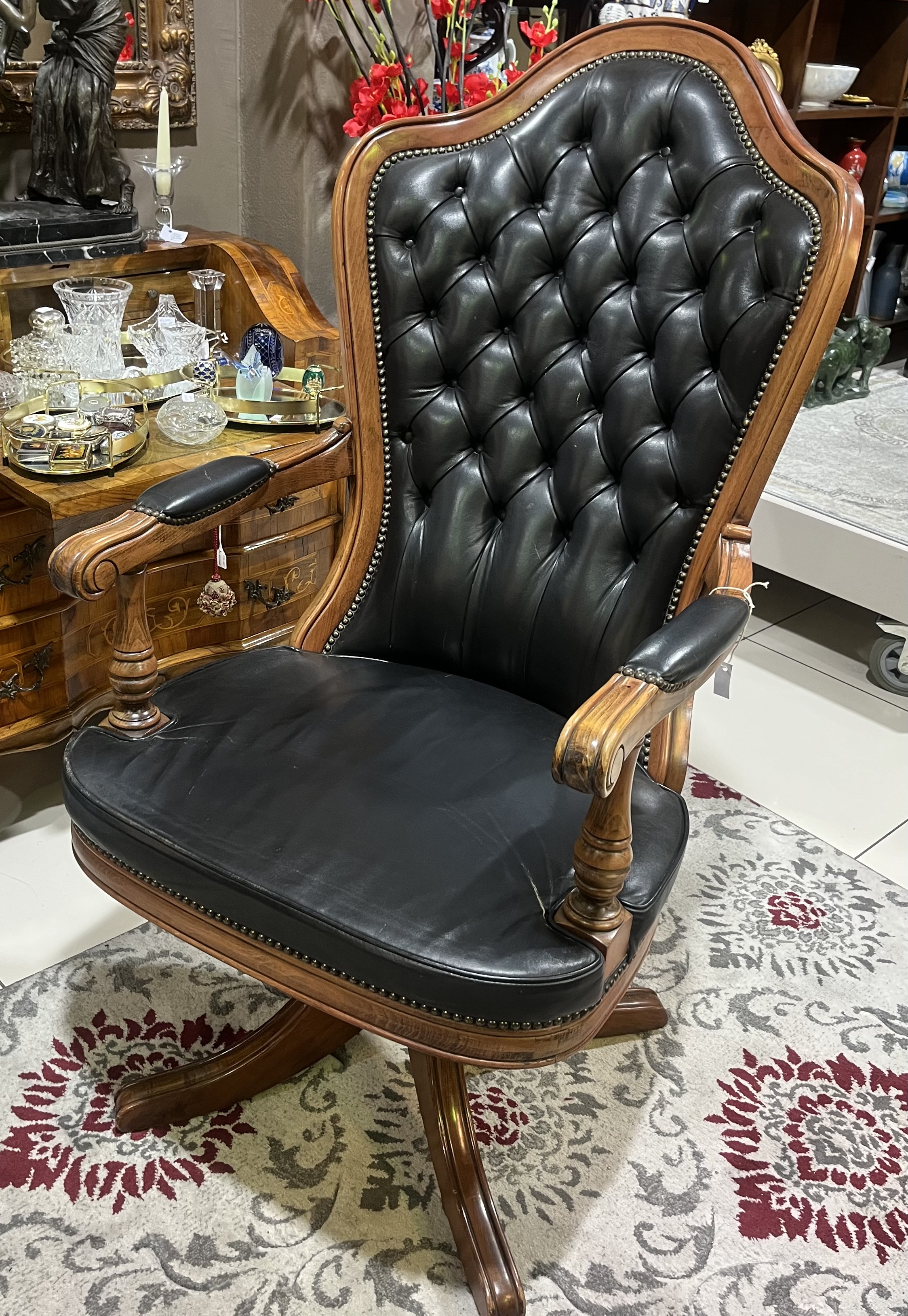 Oversized executive leather swivel armchair