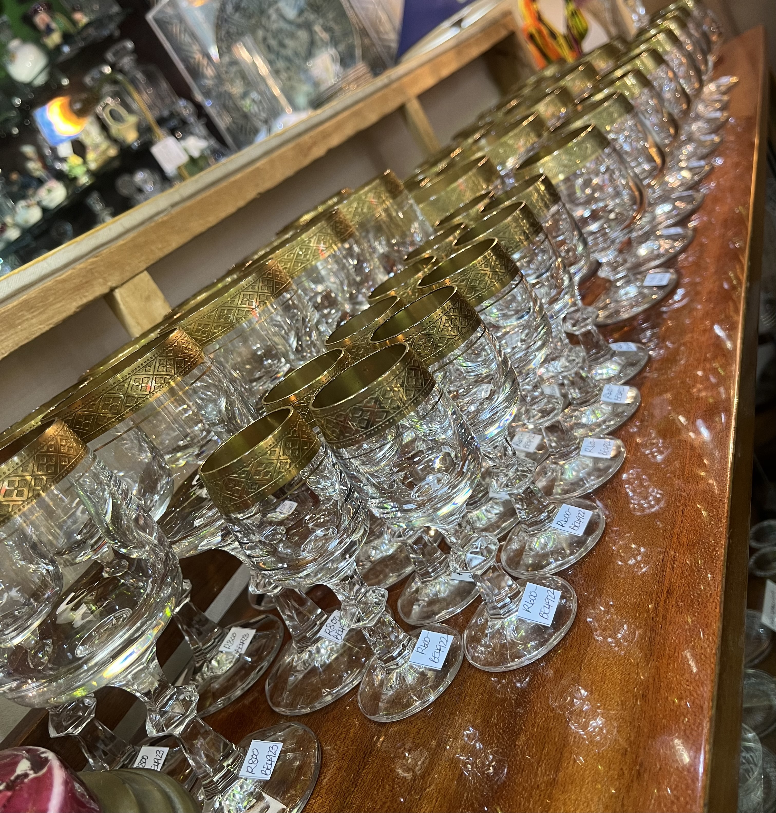 Set of Gary Barr crystal glasses with 18 carat gold rims, c1980s