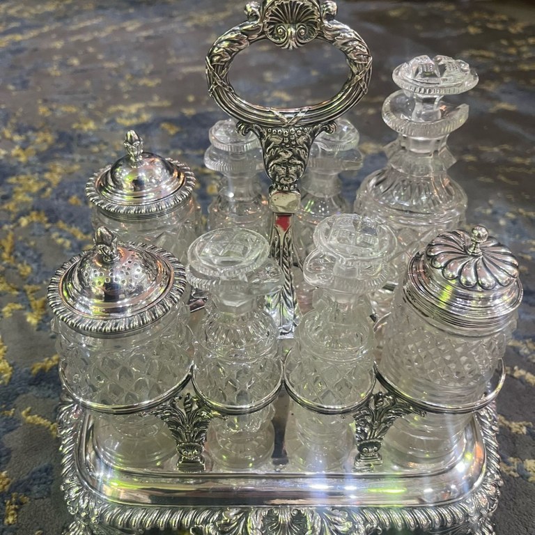 Edward Baker hallmarked silver cruet set with crystal collard condiment holders, c1899, 1.065kg