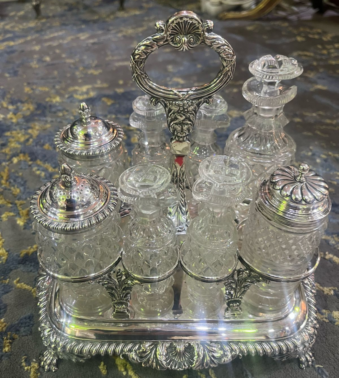 Edward Baker hallmarked silver cruet set with crystal collard condiment holders, c1899, 1.065kg