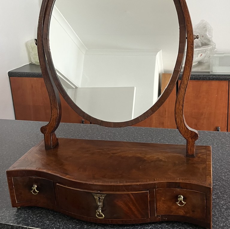 Georgian serpentine toilet mirror: R20,000