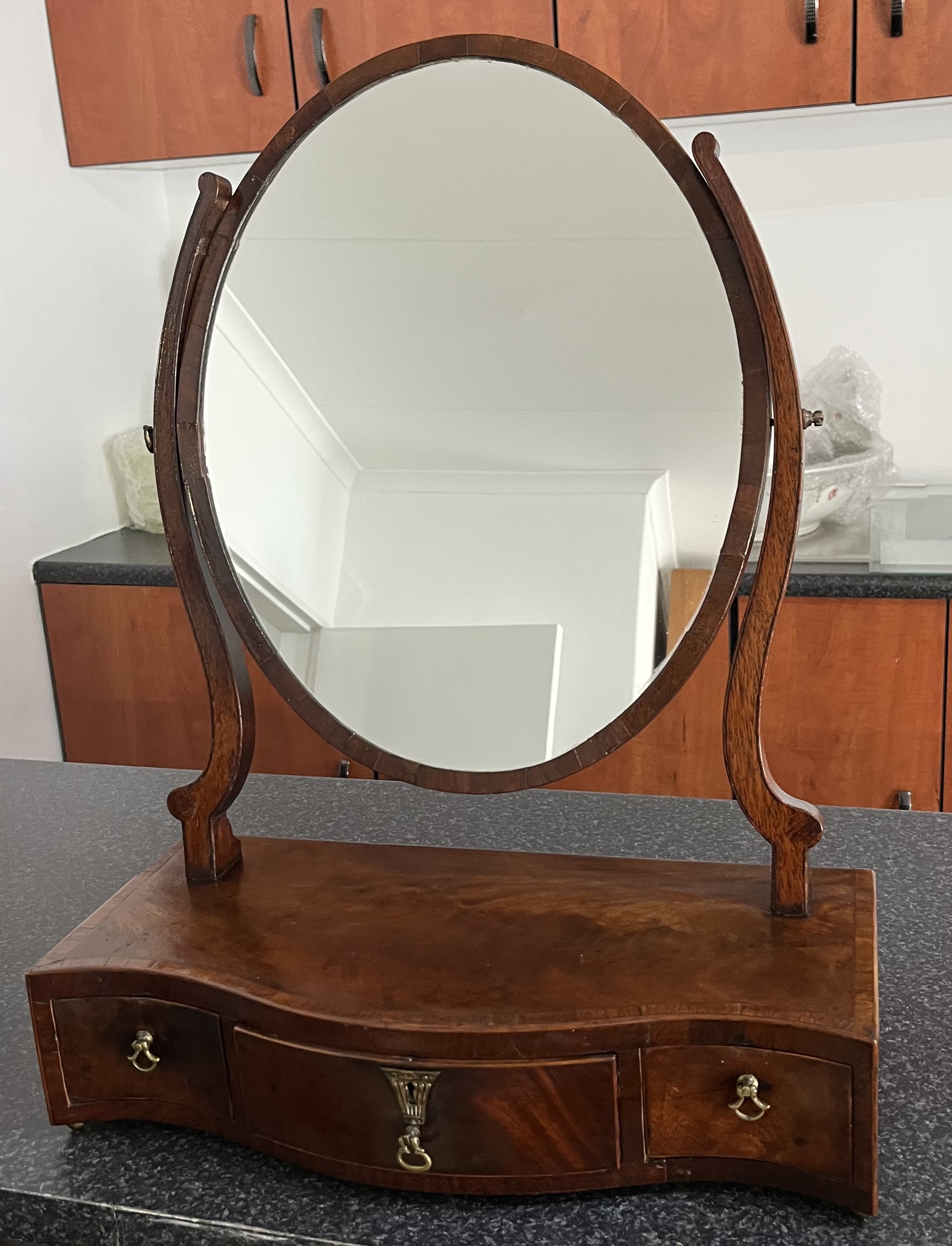 Georgian serpentine toilet mirror: R20,000