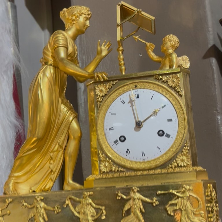 Empire style gilt bronze mantel clock: POR