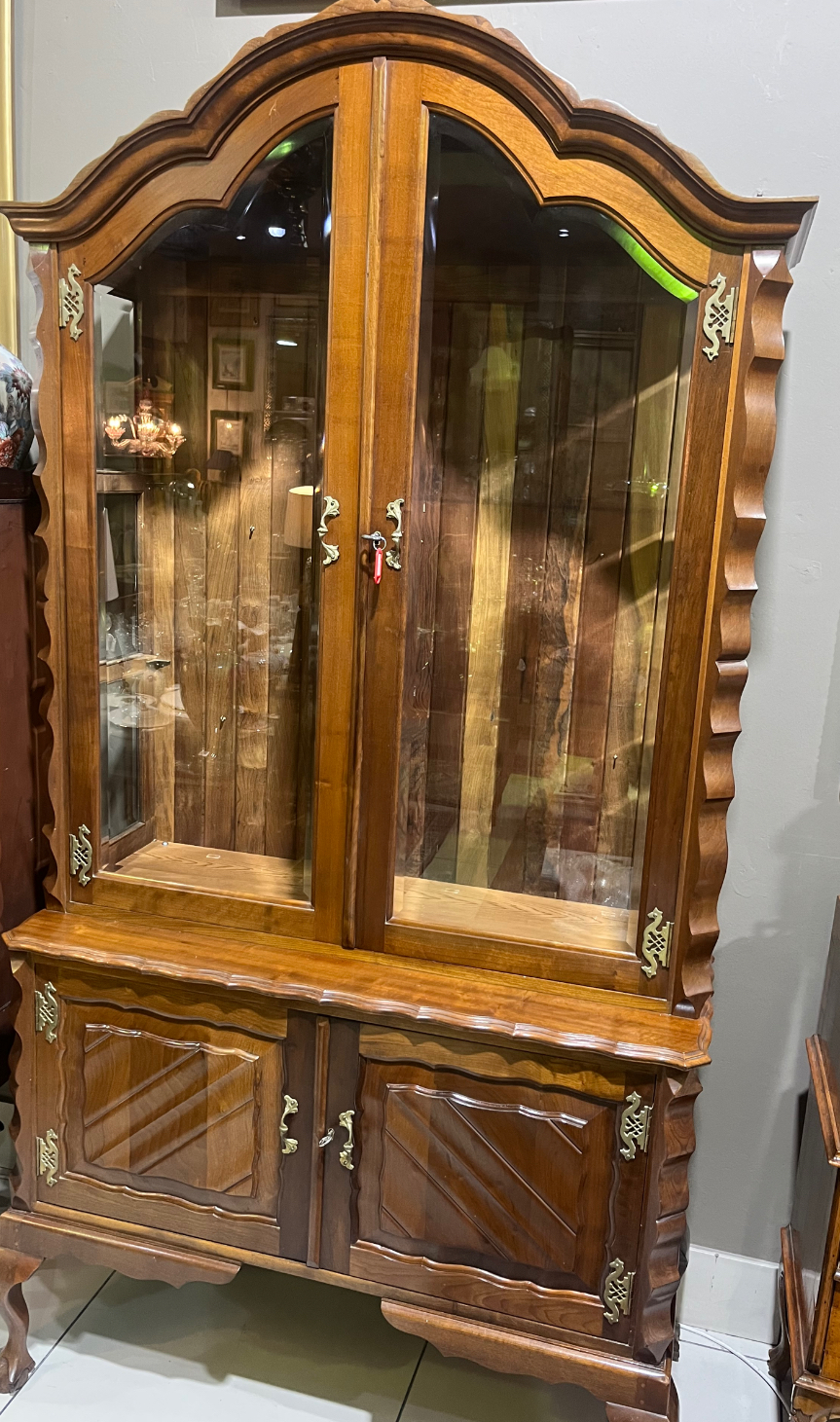 Stinkwood ball & claw display cabinet: R35,000