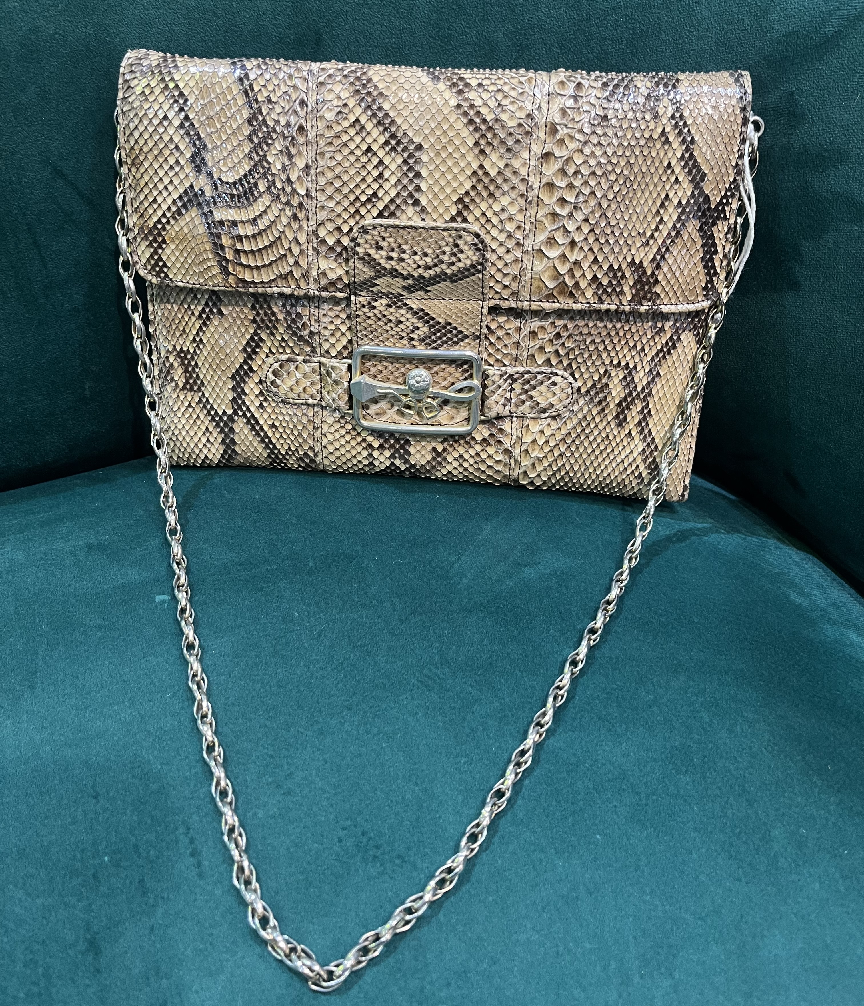 Vintage Pointer snake skin shoulder bag with silver and brass tone chain strap and clasp