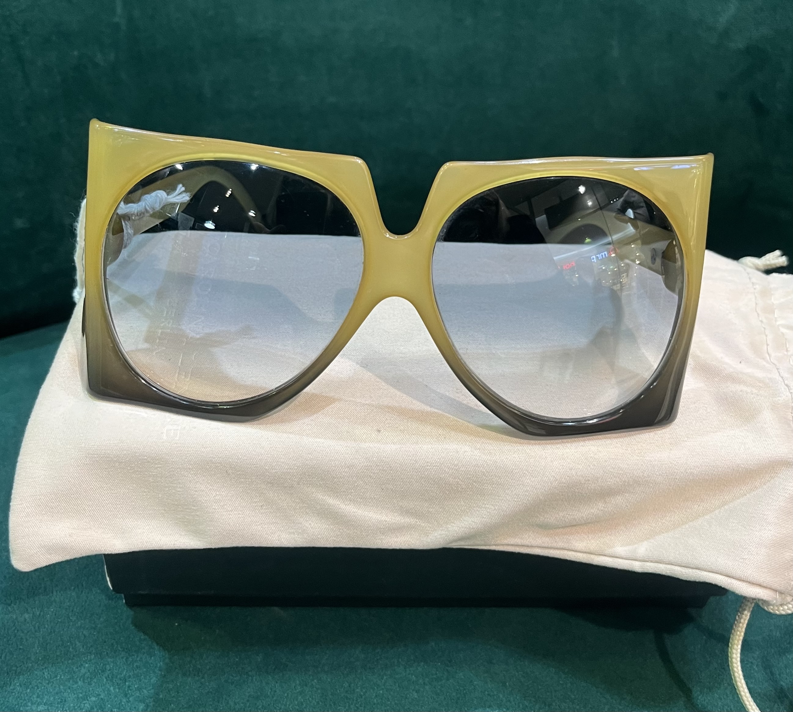 Pair of Christian Dior 1970s D03 Optyl gradient sunglasses, in pale moss green acetate frames, silver and black tone logo to temples