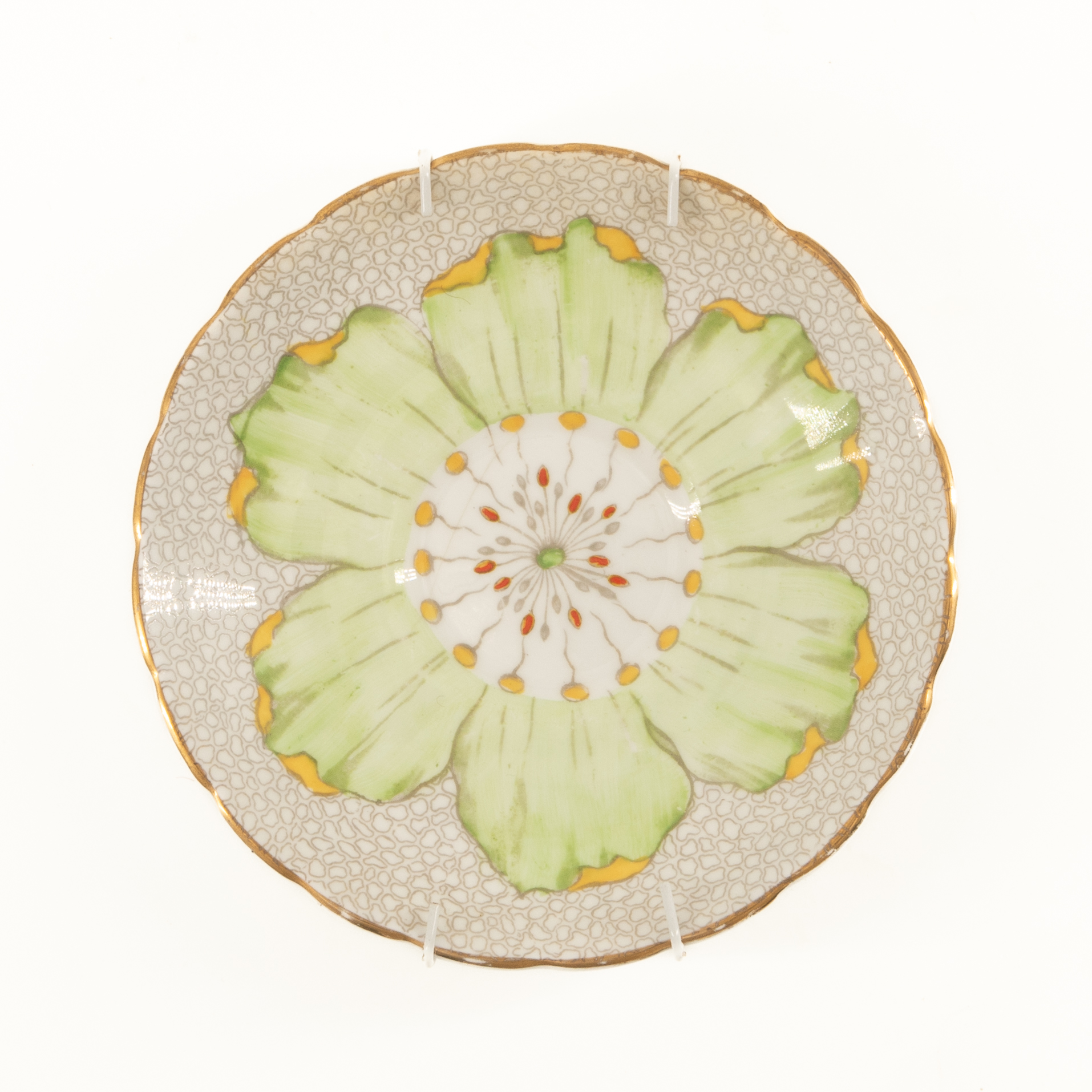 Royal Tuscan pale green and yellow lotus Art Deco style saucer: R300