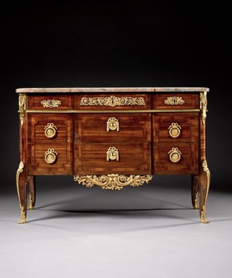A Louis XVI amaranth and bois satiné commode by Jean-Henri Riesener, circa 1779