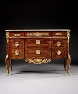 A Louis XVI amaranth and bois satiné commode by Jean-Henri Riesener, circa 1779