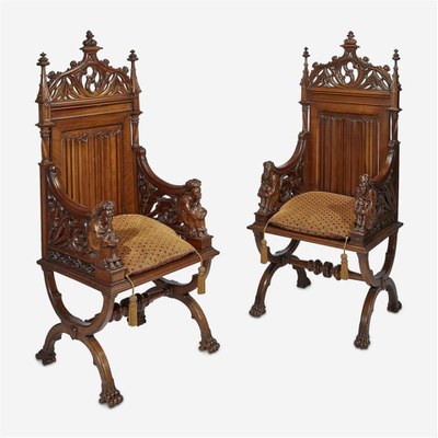 A Pair of Gothic Revival Carved Walnut Hall Chairs, Late 19th/early 20th century