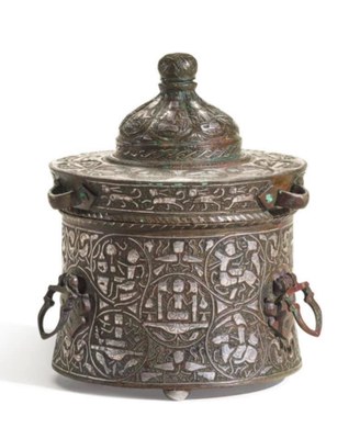 An exceptional Khurasan silver-inlaid bronze inkwell, probably Herat, circa 1200