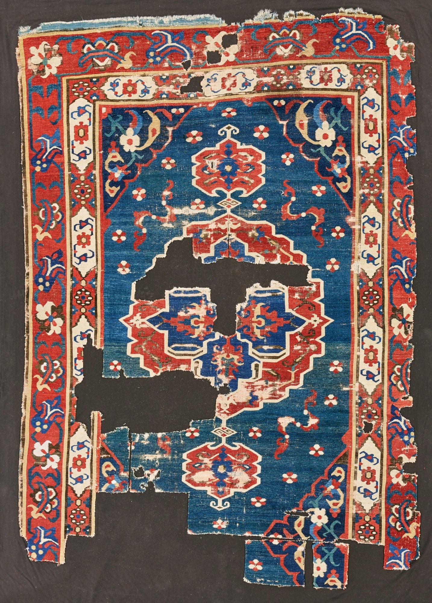 Lot 81, A Karipinar carpet fragment from the Bernheimer collection - Sotheby's