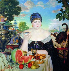 The Merchant's Wife by Boris Kustodiev, showcasing Russian tea culture