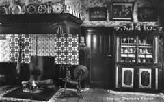 Sandpainting on the tiled floor (on the wall are handpainted decorated tiles)