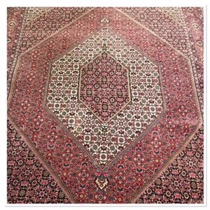 Fine Bijar with the popular fish design, woven by the Kurdish tribe in Iran, exclusively available at Ghorbany Carpets