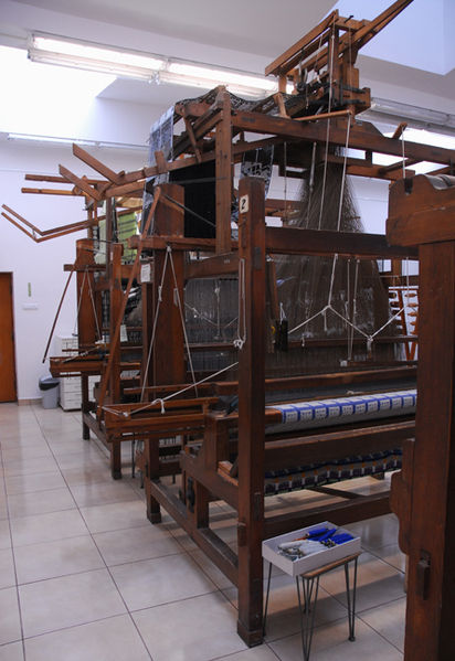 Jacquard looms in the Textile Department of the Strzemiński Academy of Fine Arts in Lodz, Poland.- Original photograph of Artprof